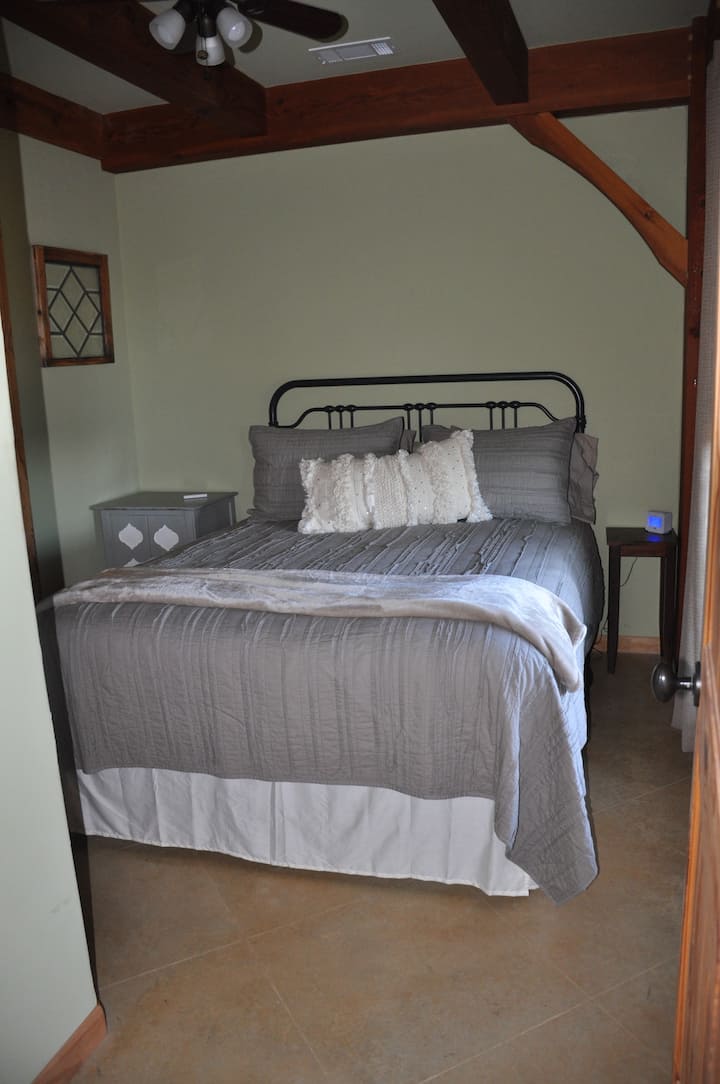 Downstairs bedroom with queen bed 