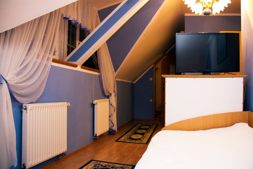Bedroom with a TV