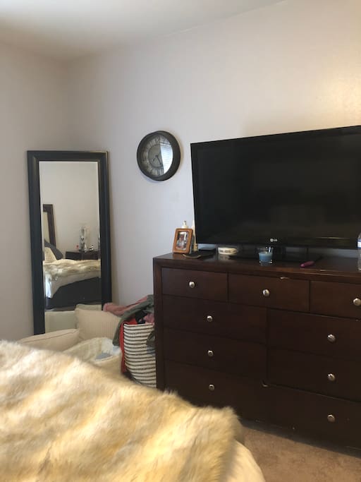 Master tv and dresser, also includes huge closet space.