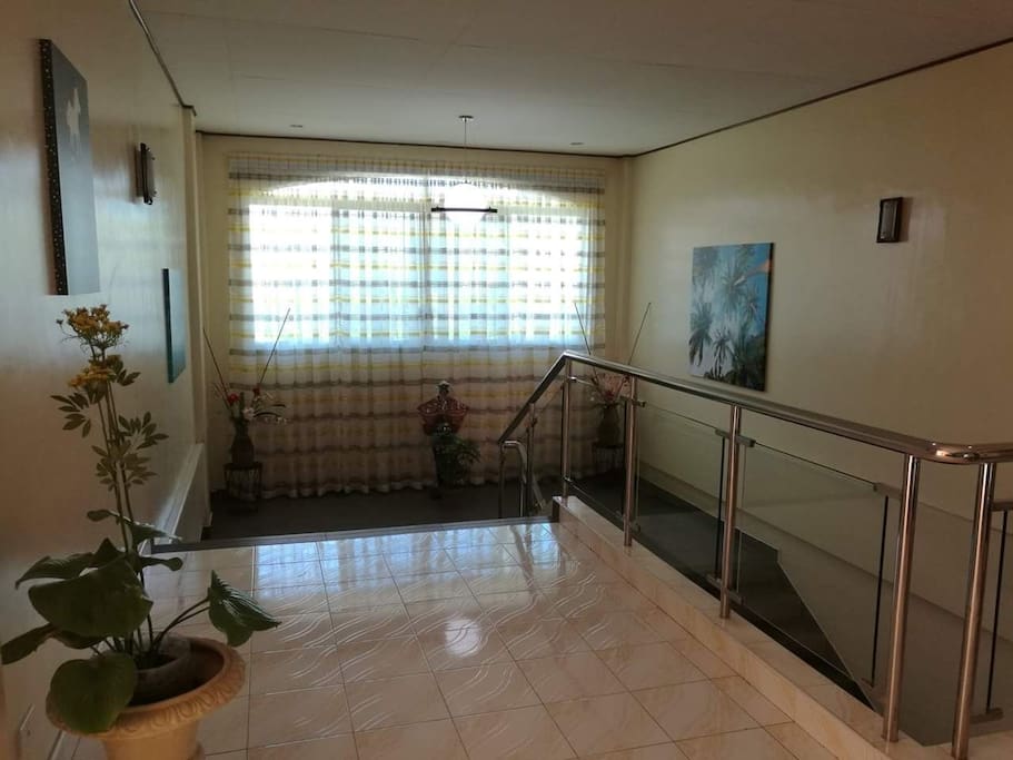 Stairs for go up to the rooms.