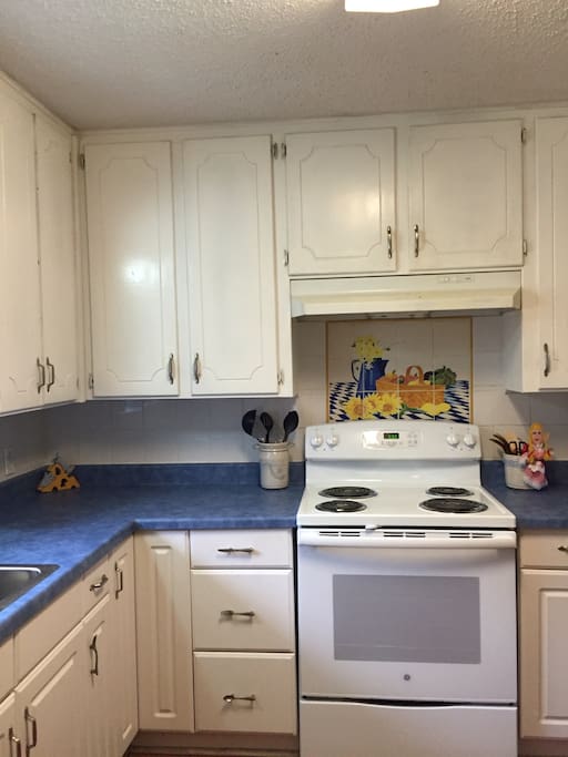 updated kitchen with tile mural