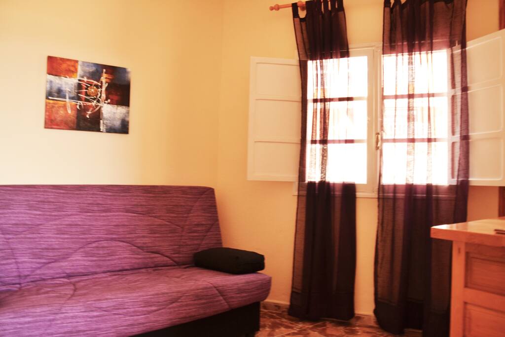 Habitación de estar, sofa cama, tv