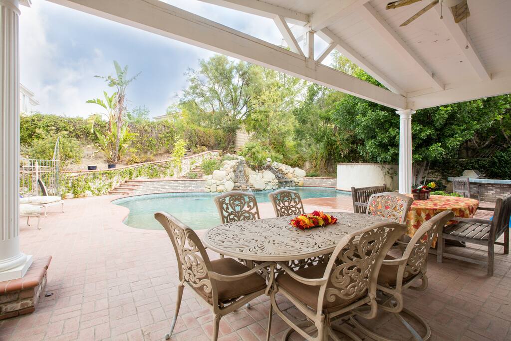 Backyard patio - BBQ, dining next to large walk-in pebble tex swimming pool with 2 waterfalls perfect for relaxing, swimming, reading, studying, meditating.