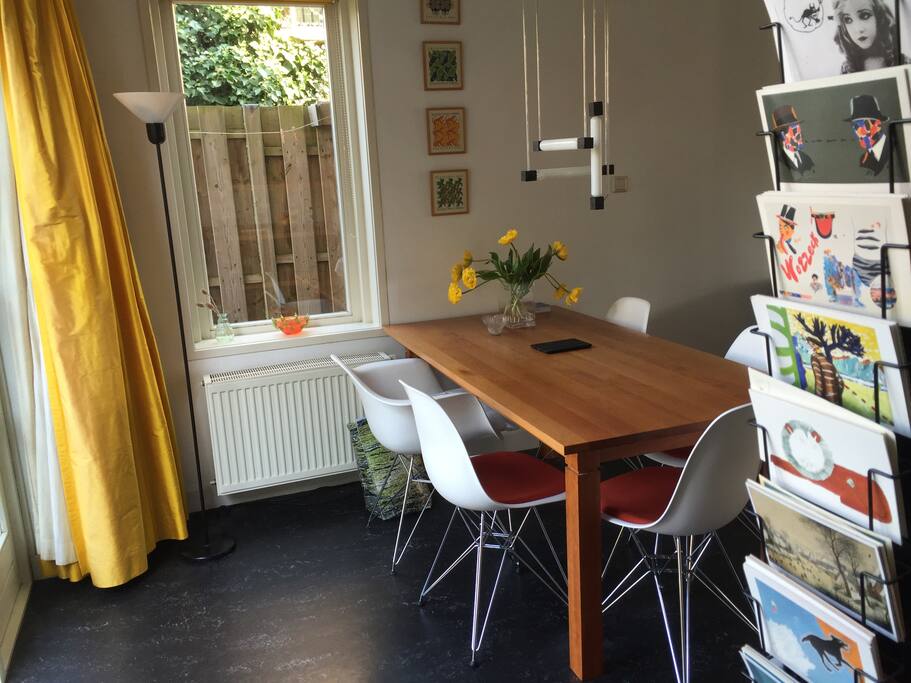 Dining table, comfortable chairs, view from the kitchen.