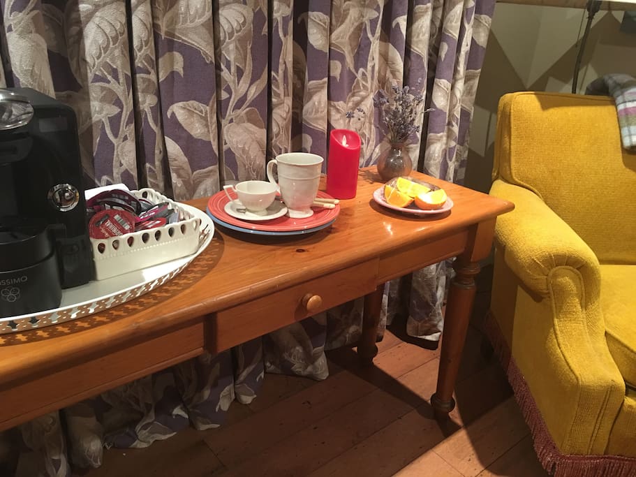 Bedroom desk with coffee and tea