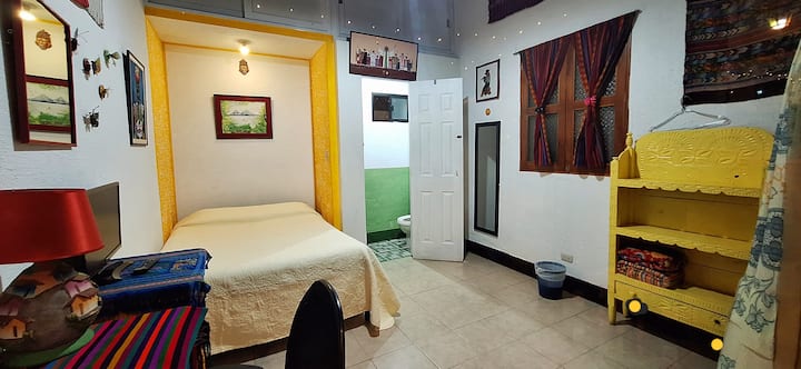 Room #1
Bedroom #1 .
It has a half-bathroom: sanitary and sink. With a table to work inside and outside the room. 
Room 1 .
It has a half bathroom: toilet and sink.  With a table to work inside and outside the room.