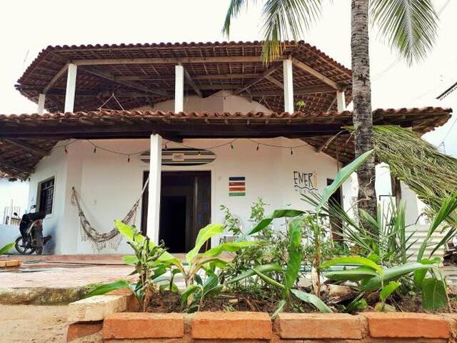 Suíte privativa em Hostel pé na areia