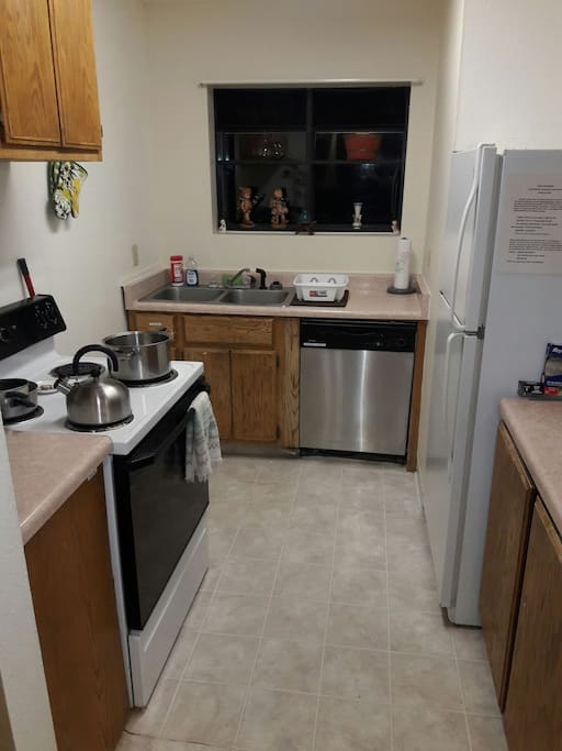 Your (possibly) shared kitchen with cookware and utensils. Please remember: when you clean up, the dishwasher works best when you have removed all food particles from dishes. Give them a good scrub so other guests can use them also! We try to keep your cleaning fee low for this reason.