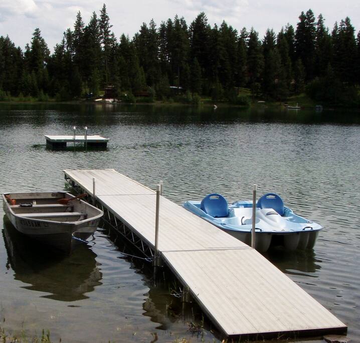 Our docks and boats. The boat on the right comes with the cabin rental and the one on the right is available for rent
