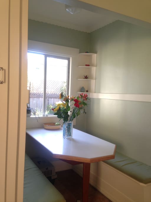 Enjoy your morning coffee in the sunny breakfast nook overlooking the garden.