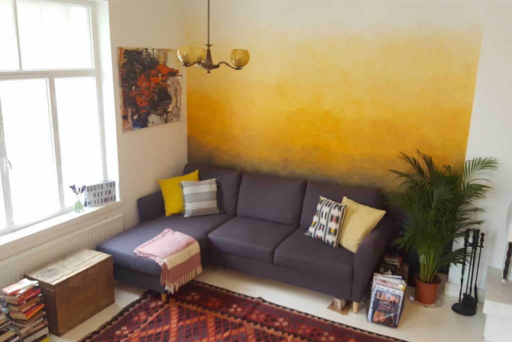 The sofa can be pulled out into a bed, comfortably sleeping two.
