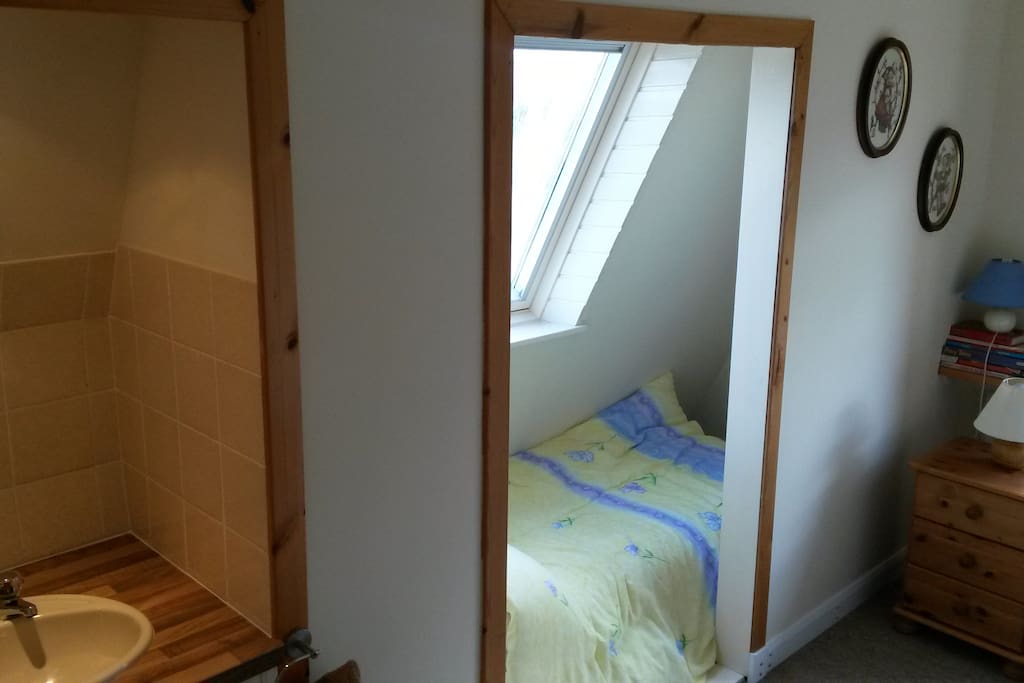 First floor twin room guest bed and wash basin