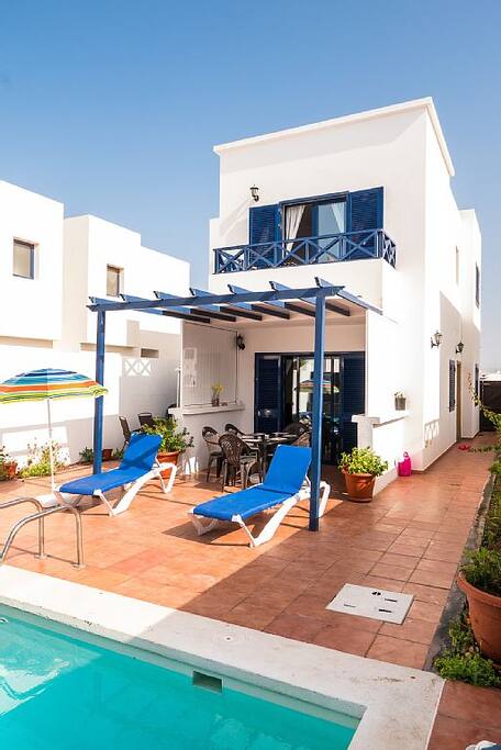 Beautiful space to relax - back of villa with pool