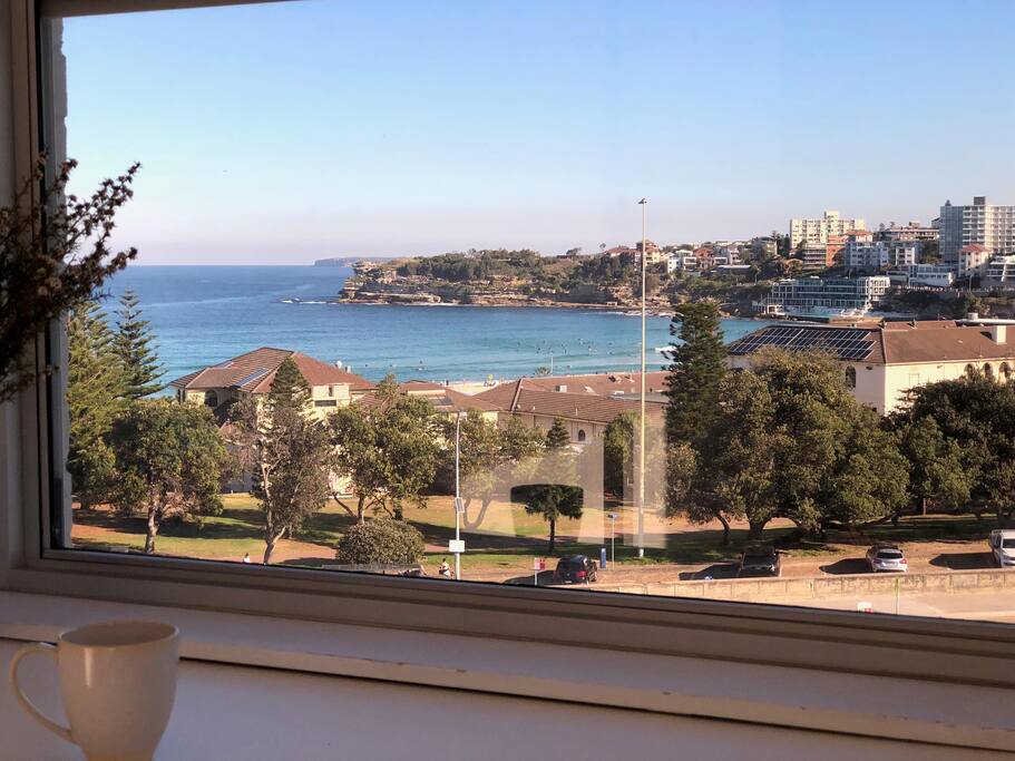 Write a postcard watching bondi beach below.