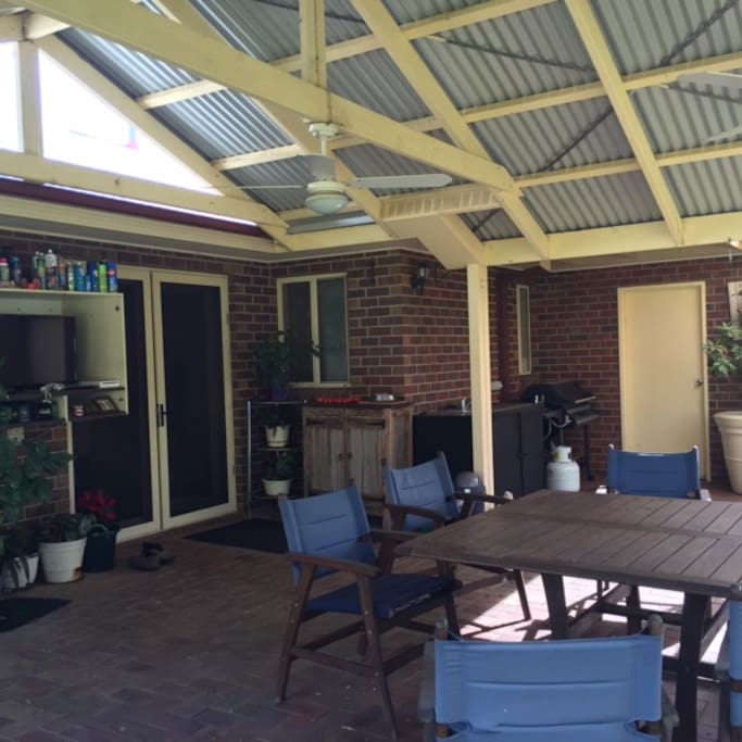 BBQ, outdoor television, eating area & ceiling fans