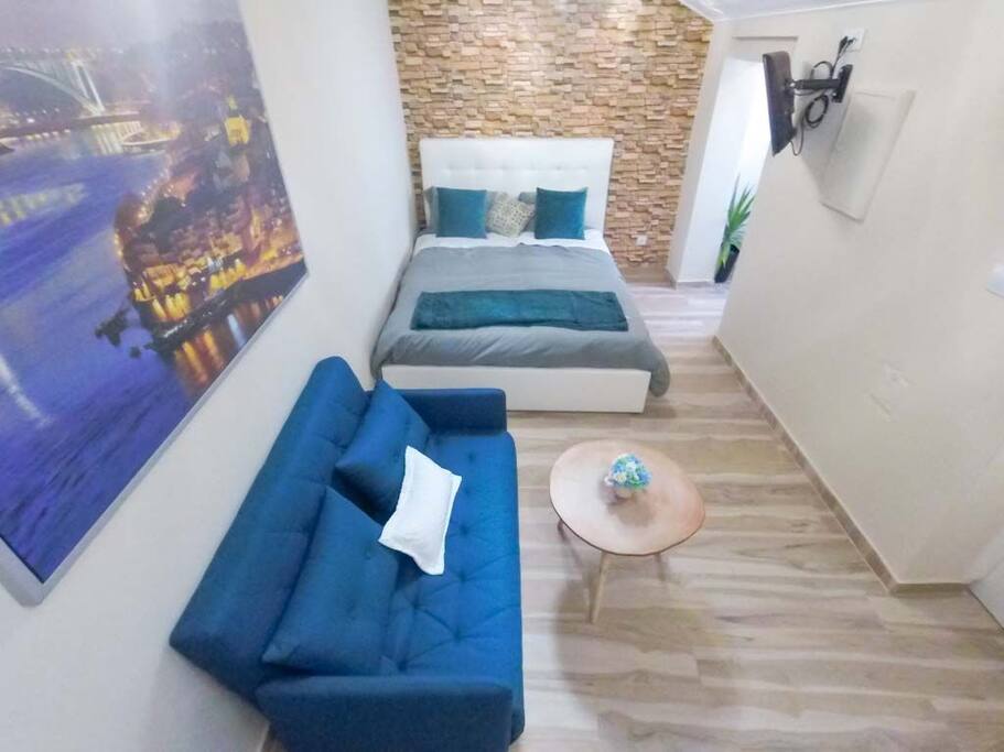 Quarto open space e sofá cama