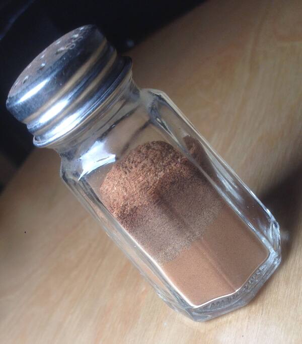 Coffee station shaker: cinnamon, nutmeg, all spice, cloves and cardamom.