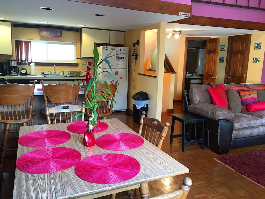 Second floor layout - living room/dining area, kitchen, half bath, and porch