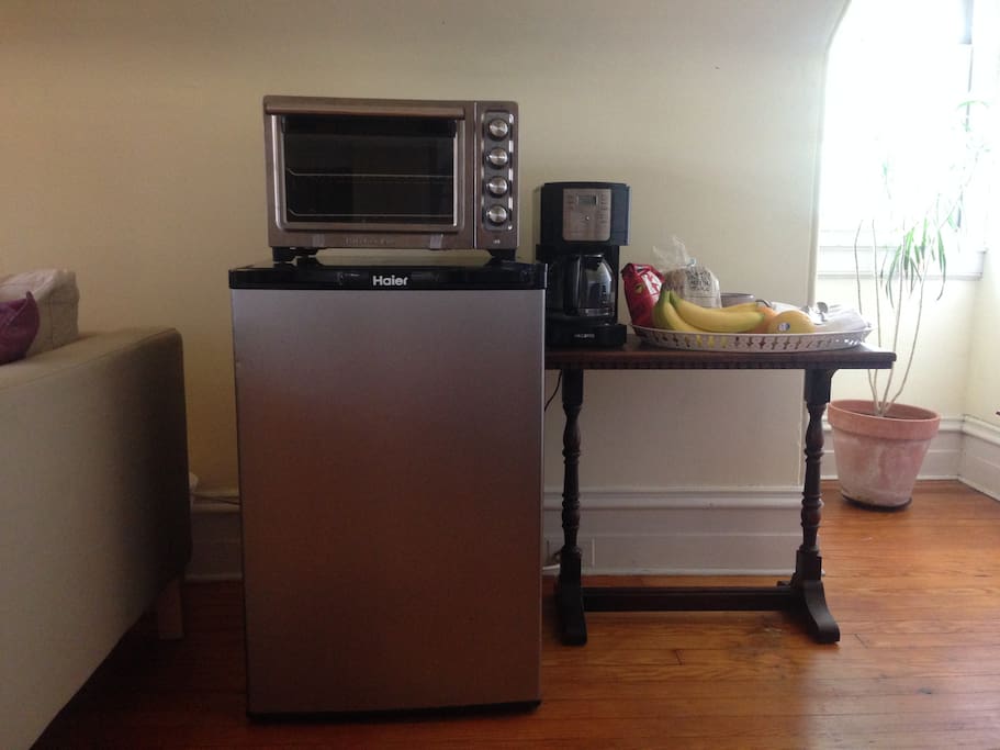 Mini-fridge, toaster, coffee maker, and some various treats for you! (treats may vary!)