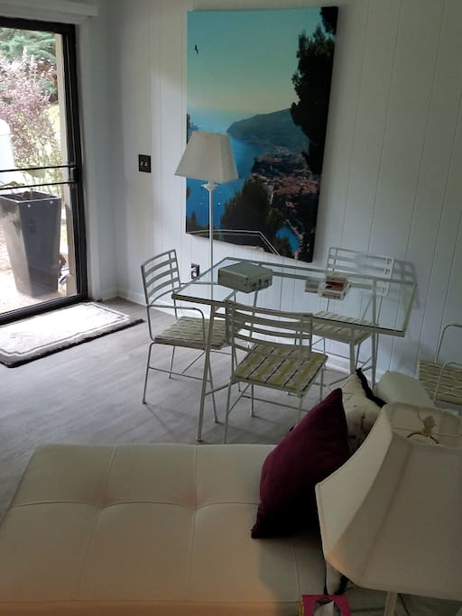 Living room with outdoor patio and big screen tv, wifi