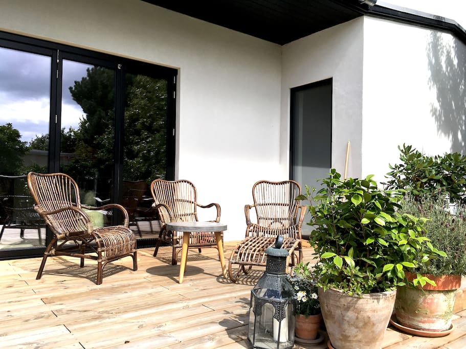 The terrace with livingroom entrance and children's room entrance