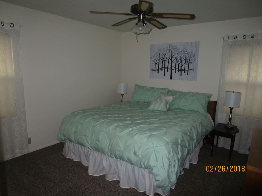 Bedroom with king size bed.