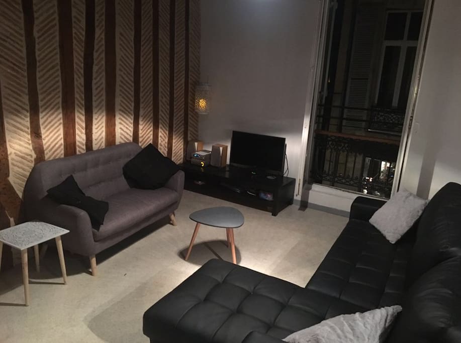 Cosy lounge showing original feature wall dating back 350 years