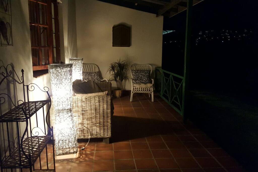 Comfortable outside seating with lighting and dartboard
