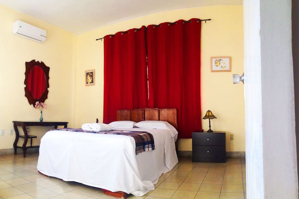 The spacious and naturally illuminated bedroom of our apartment