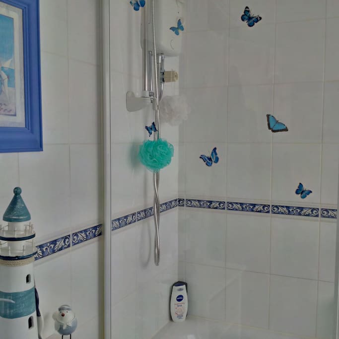 Shared Bathroom right next to room and Towels Provided