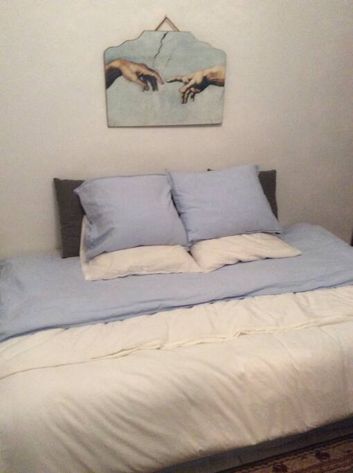 Your comfy, cozy bed awaits you.