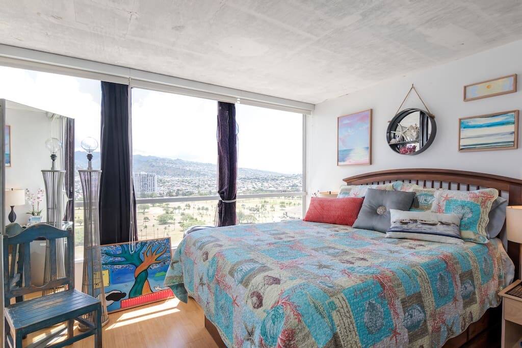 Queen Bed in room with views