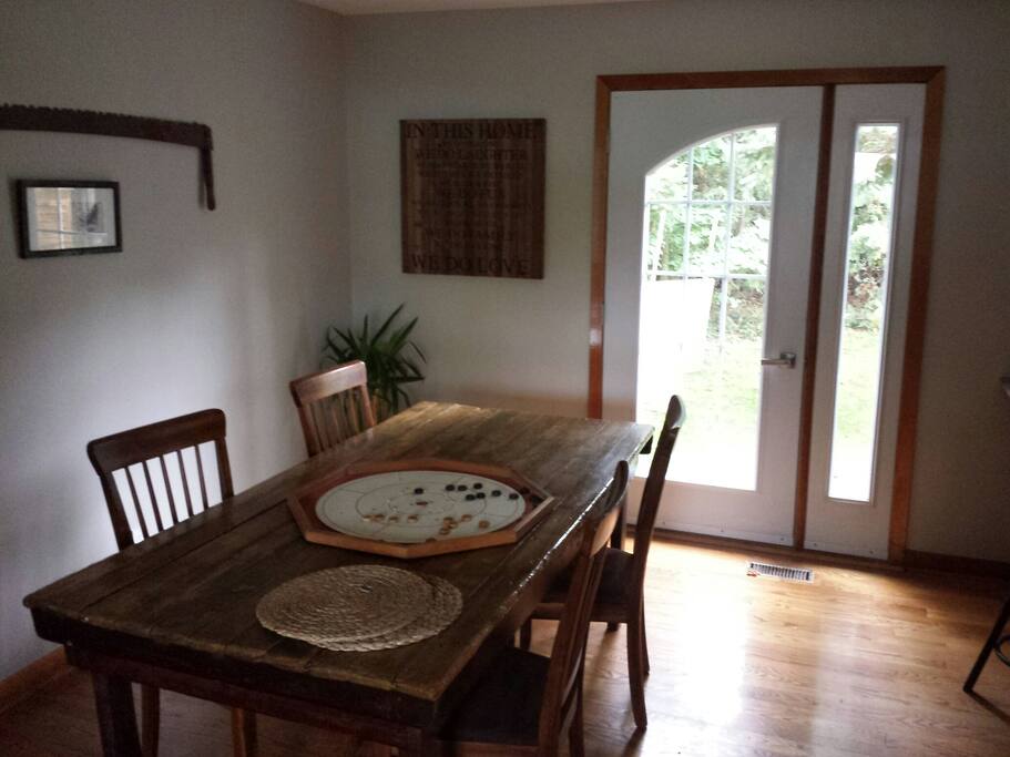 Kitchen/ding room with door out to back deck