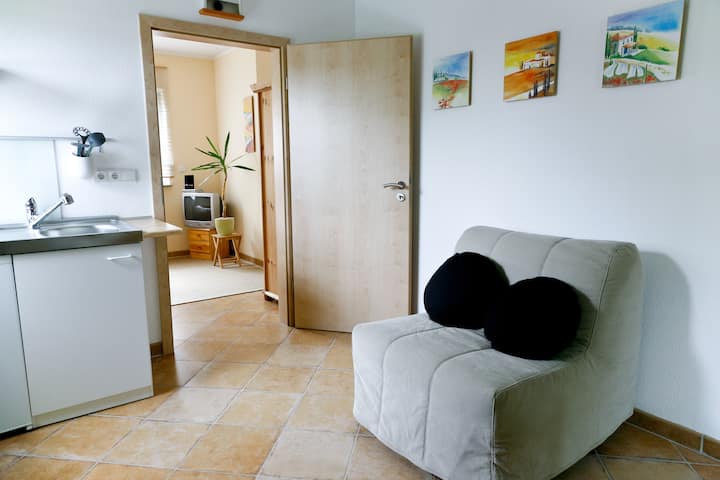 Zona e ndenjjes dhe ngrënies - Apartamenti STAYINTOWN Berlin