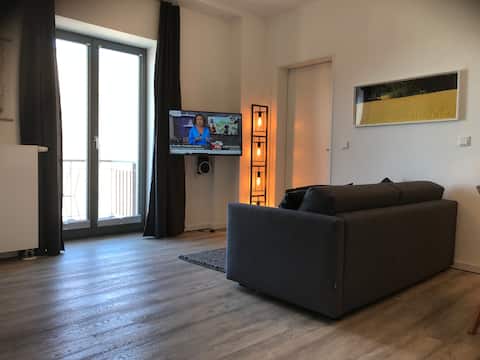 Erfolgreiche Airbnb-Immobilie: Sea view, balcony, private sauna in historic warehouse in Wismar