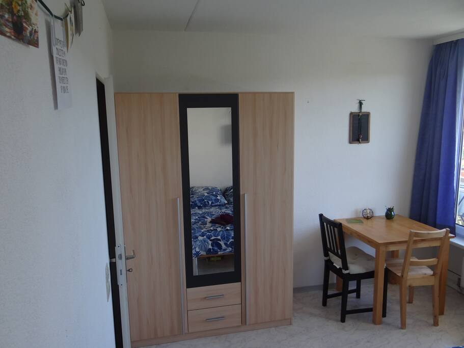 The cupboards is entirely to your use, no private things of us inside. As you can see, there's a table and two chairs, so you can read/work/etc.