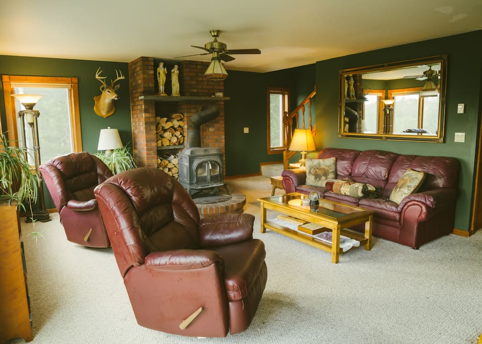 Open concept living room and kitchen with room for the whole family! Including a woodstove to cozy up to after a long day on the slopes:)