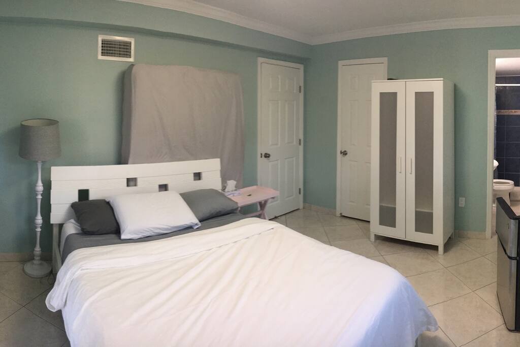 Door to hallway and bathroom