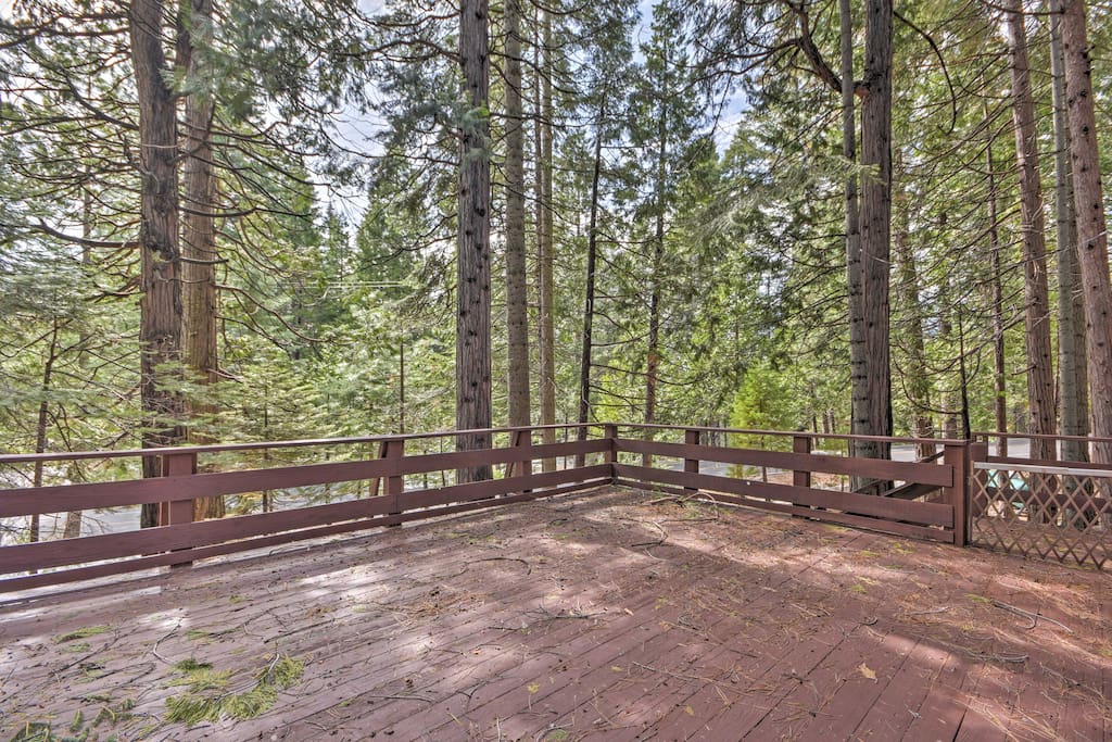 The large private deck provides ample space for everyone to enjoy the great outdoors.