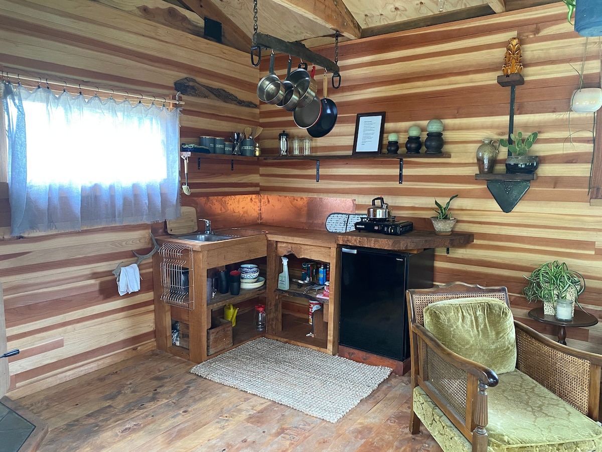 Hand built wooden kitchen space. Also Weber bbq and gas hot plate on the verandah and outside sink. at Teal Corner in Okoroire
