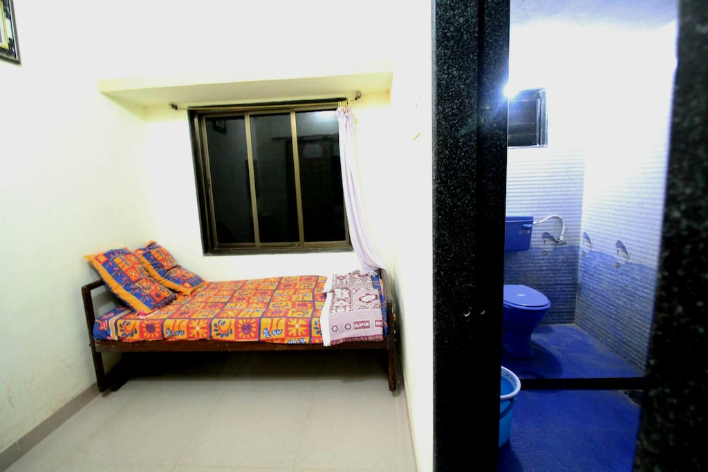 image of 1 single bed which is kept in room no 1