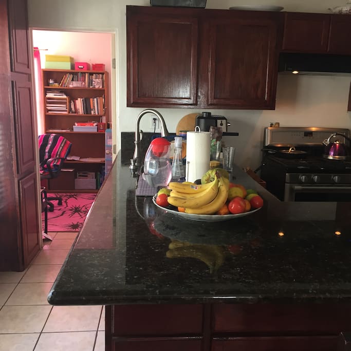 Kitchen with plenty of amenities including an expresso machine