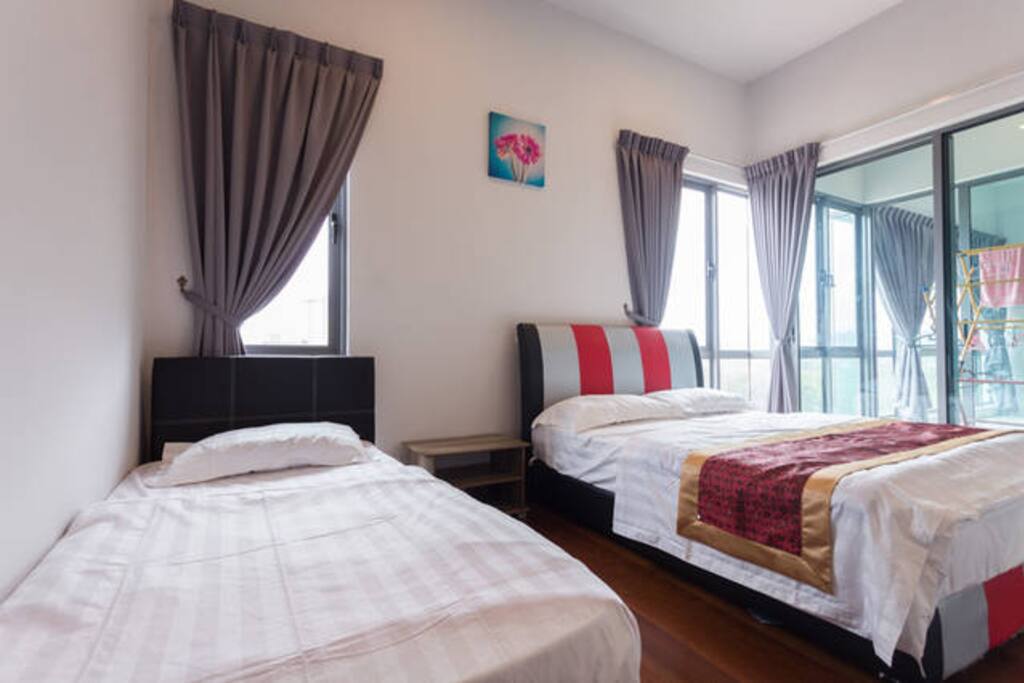 Master bedroom. 1 double bed and 1 single bed with Air-conditioner. Occupied with own washroom