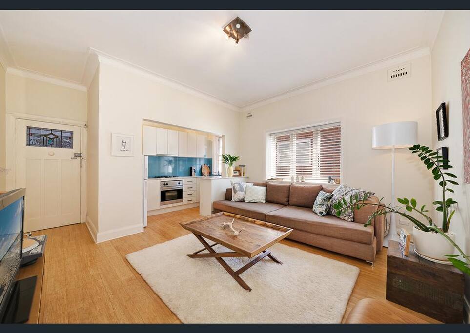 Living room and chill out area, Our new couch is much larger than the one in the picture and can easily fit 5-6 people to sit and chill. Couch can also be transformed into a queen size bed.