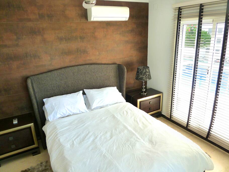 U3: UPSTAIRS BEDROOM 3. This room’s modern design and beautiful views will make you feel amazing!