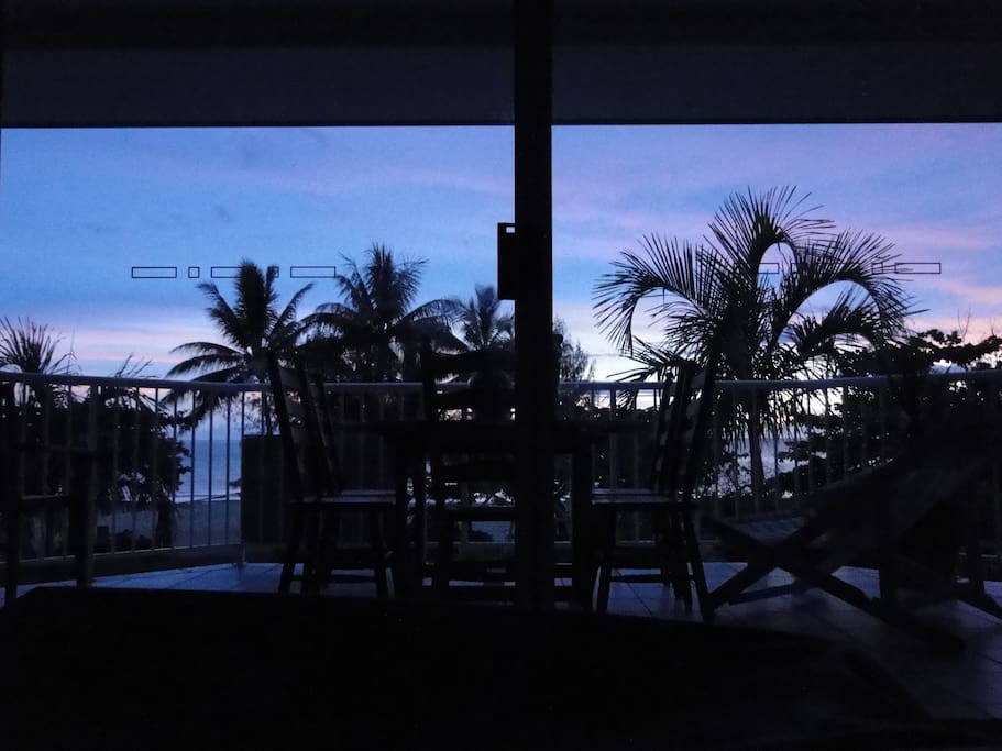 Sunrise over the Coral Sea - View from inside the living area of your apartment