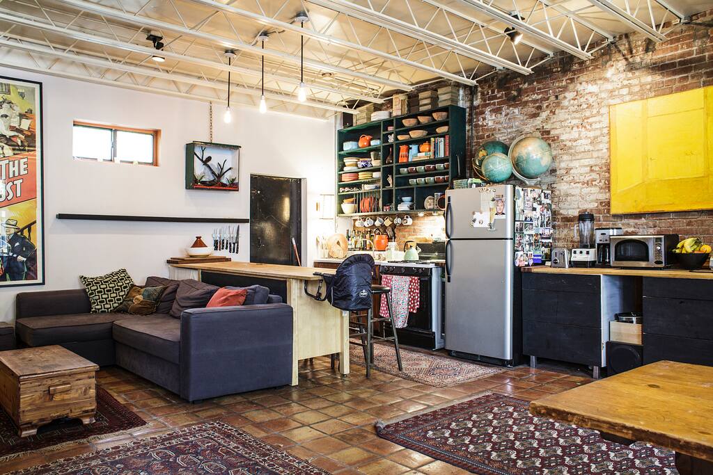 Open kitchen/living room. Good for talking, eating, reading...walled yard off kitchen has table and chairs for meals outdoors.