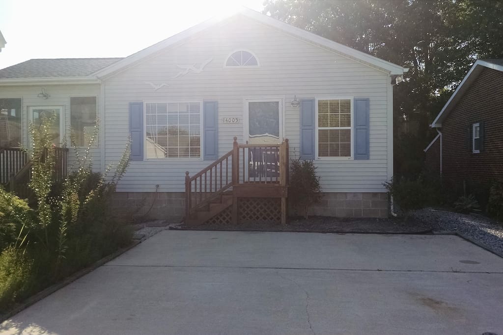 Front of house and 2 car parking pad