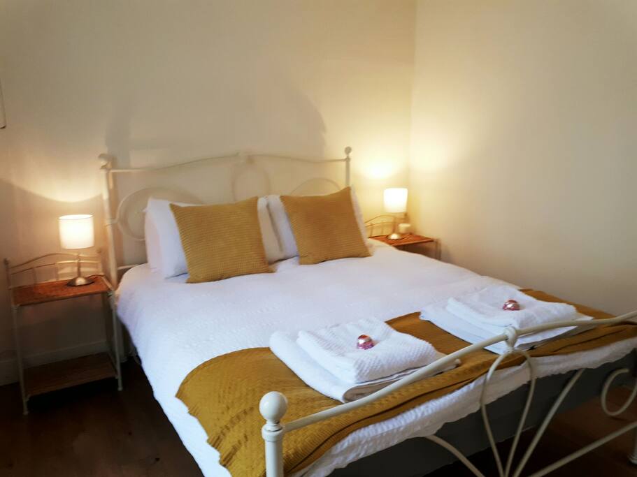 Main bedroom with comfy king size bed.