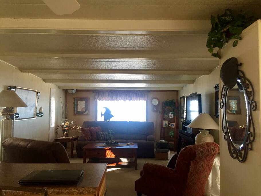 Living room area; plenty room; front windows to river;
